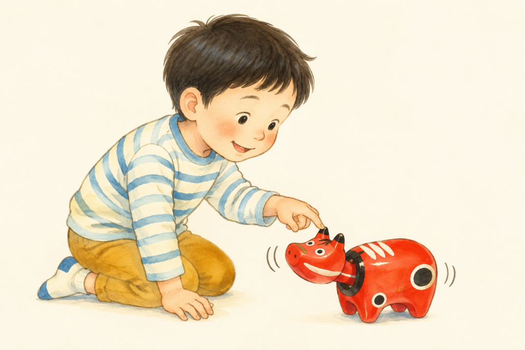 赤べこの揺れる首に指先で触れる子どものイラスト