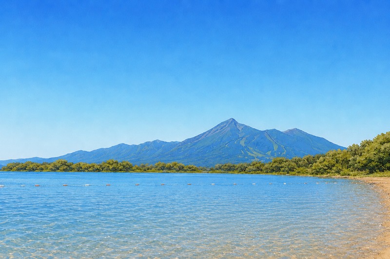 広い青空の下、猪苗代湖の向こうに磐梯山が広がる夏の風景